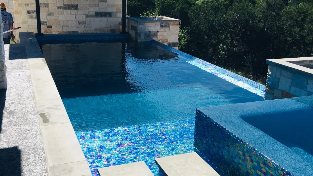Hill Country residential swimming pool and spa, provided by Tejas Hills
